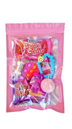 a pink bag filled with lots of candy