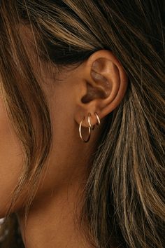 14k Gold-Filled Endless Hoop Earring Collection. Must-have delicate hoop earrings with minimal post tube closure. Set to accompany you all day + all night in pure comfort. Sold separately for you to create your own unique, every-day cascading ear stack. ✦ 14k Gold-Filled ✦ Small - 9mm / Medium - 12mm / Large - 16mm *Sold as a single earring* This item is FINAL SALE Instructions: To open- gently pull apart then gently twist to one side to create an opening to pierce your ear. Do not pull too far Italian Minimalism, List Inspiration, Silver Jewlery, Gold Hoop Earring, Small Gold Hoop Earrings, Ear Stack, Earring Collection, Pull Apart, Special Jewelry