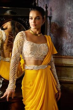 Yellow pre-draped saree featuring ruffle detailing. Paired with a pearl, bead and sequin embroidery and an embroidered belt. - Aza Fashions Ruffle Sarees, Draped Saree, Ruffle Saree, Yellow Pearl, Embroidered Belt, Drape Saree, Yellow Saree, Sequin Embroidery, Sequins Embroidery