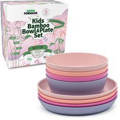 four pink and purple bowls sitting next to each other in front of a cardboard box