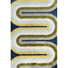 an area rug with various colors and shapes on the floor, including blue, green, yellow