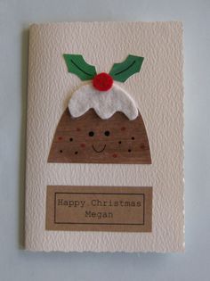 a card with a christmas pudding on it