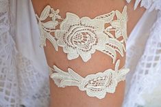 ~ Beautiful appliqued off white lace trim with flowers. The lace trim is attached to a elastic lace on the same color. A beautiful and different piece. ~ This listing is for a set of garters, one keep and one toss garter. ~Material~ ~Keep Garter ~ Lace Applique 8"x3" ~ Elastic Lace 1,5" ~Toss Garter ~Lace Appliques 6"x2," ~Elastic Lace 1,3" ~Color: Off White (29 colors) ~You pick the color upon checkout! (Colors photo #5) ~ You can choose the size of the garter while purchasing. If you choose Cu Royal Blue Garter, Brides Garter, Purple Garter, Unique Garter, Teal Blue Weddings, Lace Wedding Garter Set, Garter Lace, Bridal Garter Lace, Wedding Garter Blue