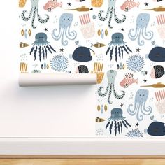 an ocean themed wallpaper with octopus, starfish and other sea creatures on it