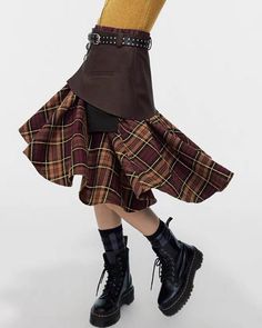 This asymmetrical brown skirt features a structured top section and a plaid bottom, accented with stylish buckles. The mix of materials and unique cut create an eye-catching piece Size:• S: Waist: 70cm/ 27.6 in, Length: 66cm/ 26.0 in• M: Waist: 74cm/ 29.1 in, Length: 68cm/ 26.8 in• L: Waist: 78cm/ 30.7 in, Length: 70cm/ 27.6 in Material: Polyester, Vegan Leather Brown Asymmetrical Skirt For Work, Brown Asymmetrical Skirt For Workwear, Brown Asymmetrical Skirt For Fall, Brown Fitted Asymmetrical Skirt, Fitted Brown Asymmetrical Skirt, Fitted Asymmetrical Brown Skirt, Fall Asymmetrical Skirt With Belt Loops, Fall Patchwork Asymmetrical Skirt, Brown Mini Skirt With Belt Loops