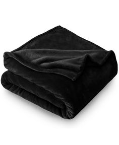 two black blankets folded on top of each other