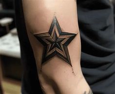 a man with a star tattoo on his arm