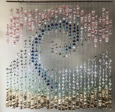 an art piece made out of many different types of butterflies