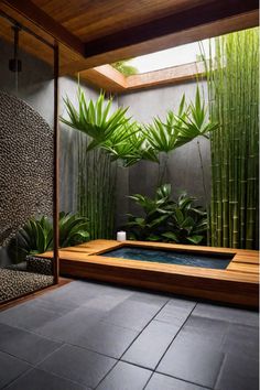 Zen bathroom with Japanese soaking tub and natural elements Sunken Bathtub Japanese Style, Japanese Sunken Bath, Wet Room With Japanese Soaking Tub, Japanese Tubs Soaking, Japanese Pool Design, Japanese Spa Design, Atrium Bathroom, Zen Bathtub, Japanese Zen Interior Design