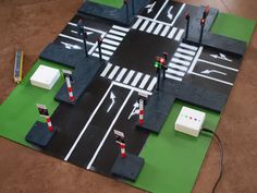 an overhead view of a city street with traffic lights