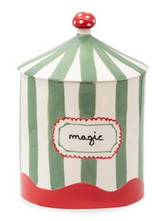 a green and white striped canister with a red polka dot on the top that says magic