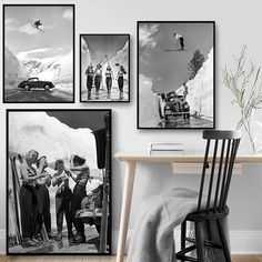 four black and white photographs hanging on the wall next to a desk with a chair