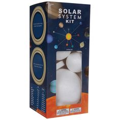 the solar system kit includes two white balls and an open cardboard box with gold trim