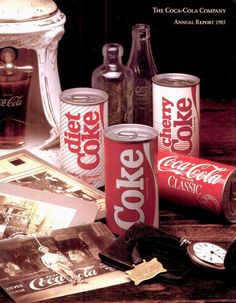 an advertisement for coca - cola and other beverages on a table