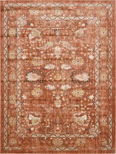 an orange and beige rug with floral designs