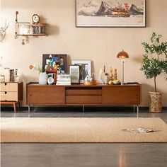 a living room scene with focus on the coffee table and sideboard in the foreground