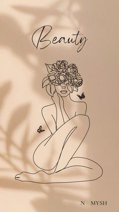 a drawing of a woman with flowers in her hair and the words beauty on it