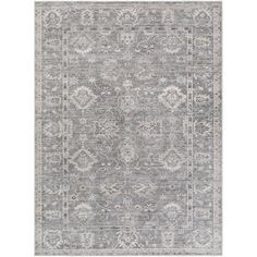 a gray and white rug with an ornate design