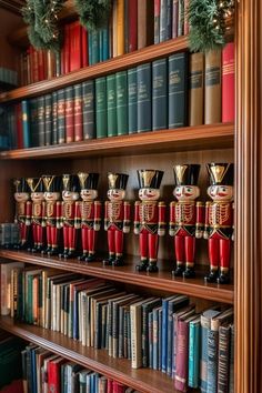 the bookshelf is filled with lots of books and toy soldier figurines