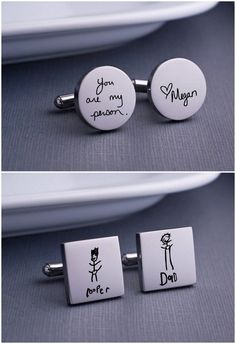 two cufflinks that have been written on them