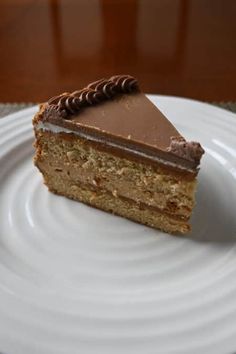 a piece of cake sitting on top of a white plate