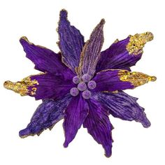 a purple flower with gold glitters on it's petals is shown against a white background