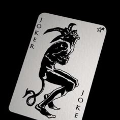 the joker playing card is shown in black and white