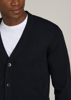 Get Wrapped Up in Warmth So Soft, So Stylish Experience the luxury of our Merino Wool Cardigan Sweater for Tall Men. This stylish tall men's sweater is perfect for layering over dress shirts or tees, offering both warmth and sophistication. Its ribbed cuffs and hem ensure a snug fit, while the modern fit keeps you looking sharp.• Tall men's merino wool sweater for superior warmth and softness• Ribbed cuffs and hem for a secure, stylish fit• Long sleeves and modern fit perfect for tall men SIZE & Black Formal Cardigan For Fall, Business Winter Cardigan With Long Sleeves, Formal Black Cardigan For Fall, Business Long Sleeve Winter Cardigan, Classic Winter Cardigan For Business, Fitted Classic Cardigan For Layering, Classic V-neck Outerwear For Business, Black Long Sleeve Sweater For Formal Occasions, Black Long Sleeve Formal Sweater