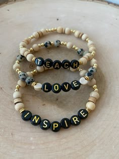 ❤️Back to School TEACHER stack These bracelets are super stylish, comfortable and perfect for daily wear! Such a chic boho-look! The matte Dalmatian Jasper stones and neutral wood make a beautiful contrast! (These are meant to fit snug. If you would like them to feel loose and move around on your wrist, please size up). A must have for your favorite TEACHER, as BACK TO SCHOOL gift, TEACHER APPRECIATION gift or for anyone you know who teaches with heart! Each bracelet is carefully handmade with h Teacher Bracelet, Boho Bracelets Stack, Sisters Jewelry, Homemade Bracelets, Teach Love Inspire, Wood Bead Bracelet, Sister Jewelry, Word Bracelet, Clay Bracelet