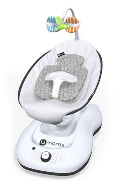 an infant's high chair with a toothbrush in it