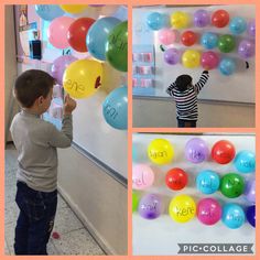 a child is holding up balloons and writing on the wall with words that spell out their name