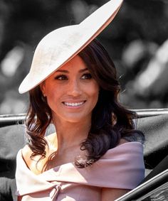 the duke and princess of cambridge are all smiles as they ride in an open carriage