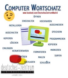 the computer workstation has many different types of computers on it, including one with a smiley face