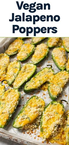 an image of vegan jalapeno poppers on a baking sheet with text overlay