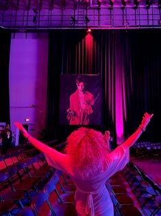 Woman with her arms open as if in adoration before an image of musician Prince, at Paisley Park Studios, in Minneapolis Prince Purple Rain Movie, Purple Rain Album, Purple Rain Movie, Musician Prince, Spiritual Man, Prince Purple Rain, Lace Mask, Right To Choose