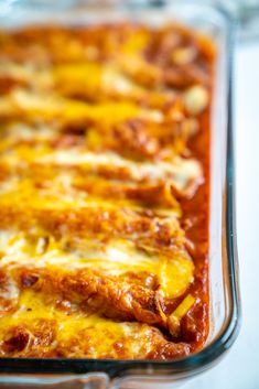 a casserole dish with meat and cheese in it