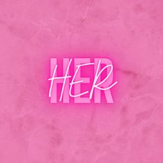 the word her written in neon pink on a marble background