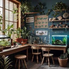 a room filled with lots of plants next to a wall covered in posters and pictures