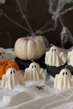 Add instant autumn ambiance! These adorable Ghost Candles small and large come together, they are the perfect addition to your Halloween decor! Handmade with love, this spooky ghost candle is designed to bring a touch of whimsy to your home during the Halloween season. Crafted with attention to detail, Its cute ghost shape will add a pop of festive cheer to any room, instantly creating a cosy and inviting atmosphere. Embrace the spirit of the season and bring a touch of magic into your home with Ghost Candles Diy, Air Dry Clay Ghost Tea Light, Clay Ghost Tealights, Ghost Candle Holder, Halloween Ghost Candles, Ghost Candles, Aesthetic Candles, Designer Candles, Handmade Candles