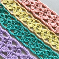 three crocheted laces in different colors