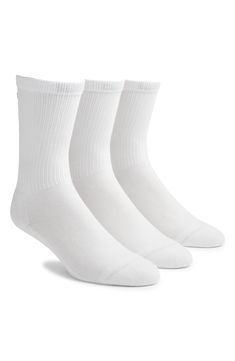 Stock up on these essential socks cut at a versatile crew length with a hint of stretch for everyday comfort. Pack of three pairs Tencel® modal/cotton/spandex Tencel modal is a more-sustainably produced fiber made with closed-loop processing and is certified with the EU Ecolabel as having a low environmental impact throughout the entire lifecycle Machine wash, tumble dry Imported Essential Socks, Mens Crew Socks, Sock Packs, White Socks, White Sock, Wedding Board, Nordstrom Store, Environmental Impact, Men Shoes Size