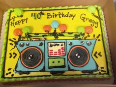 a birthday cake that is shaped like a boombox