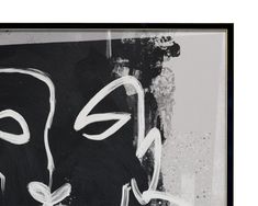 a black and white painting with two masks on it