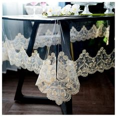 an image of a table with lace on it