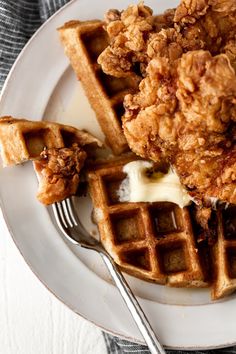 fried chicken and waffles on a white plate