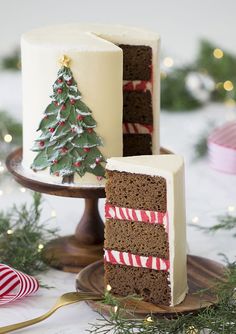 two pieces of christmas cake sitting on top of a table