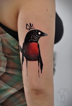 a bird with a crown on it's head is shown in this tattoo design