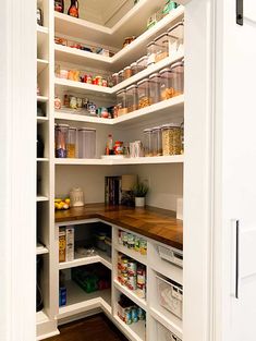 an organized pantry with lots of food in it