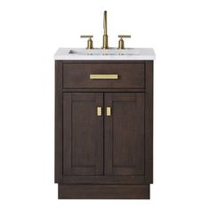 a bathroom vanity with two sinks and gold faucets on the top, against a white background