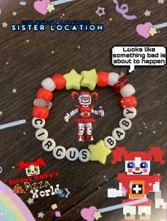 a bracelet with an image of a clown on it that says, sister location looks like she's about to happen